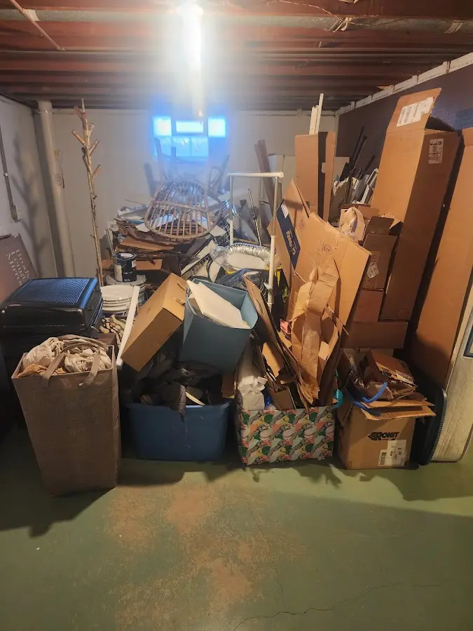 Roll-off dumpster container at job site for 6 Yard Dumpster Rental in Long Branch